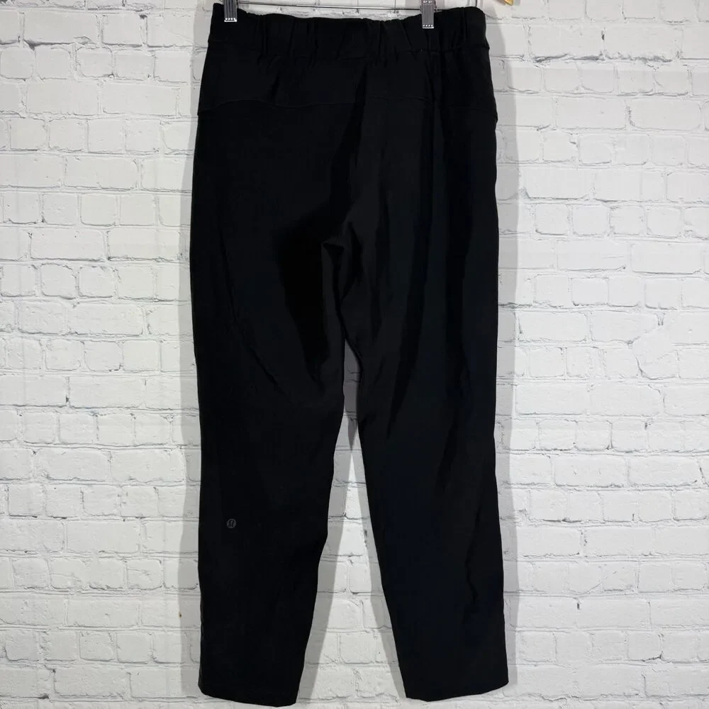 Lululemon On The Fly Pants Black Women's Size 6 Tapered Drawstring W5BPMS